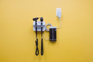 Medical equipment on yellow wall